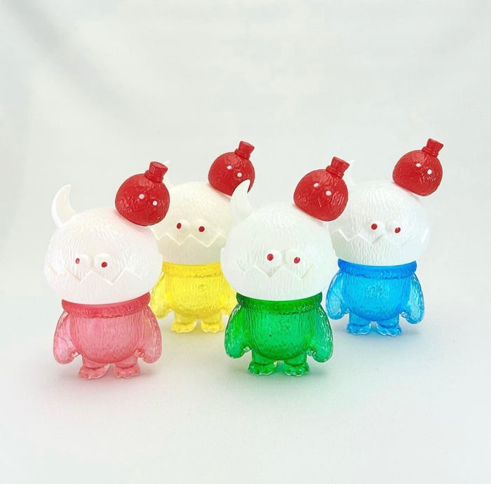 Japanese Sofubi Bobo Coconut Cream Soda toy with plastic animal figures and baby toys.