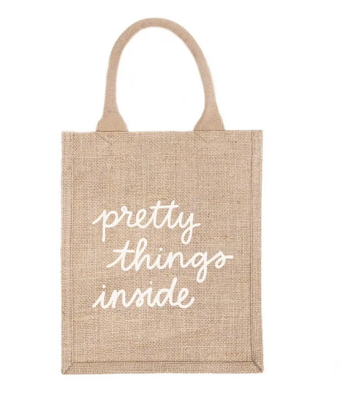 Jute bag with 'pretty things inside' text on a white background