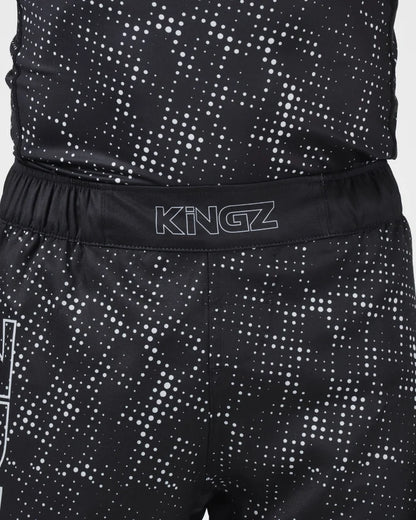 Kingz Acid Wash Shorts Black - Close Up Waistband Detail KINGZ Outline White Text Waistband Black Base White Dot Acid Wash Gradient Pattern Sublimated Fabric Texture Men's Grappling Shorts No-Gi BJJ [color:Black/Patterned]