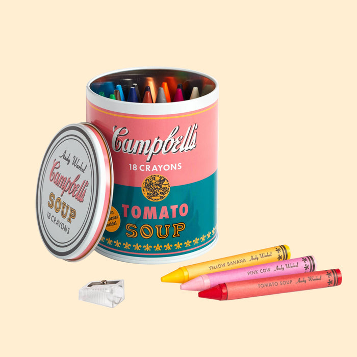 Campbell's Soup can-shaped container with crayons on a white background