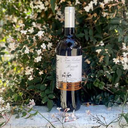 Calabretta Rosato wine bottle with silver cap and cream label