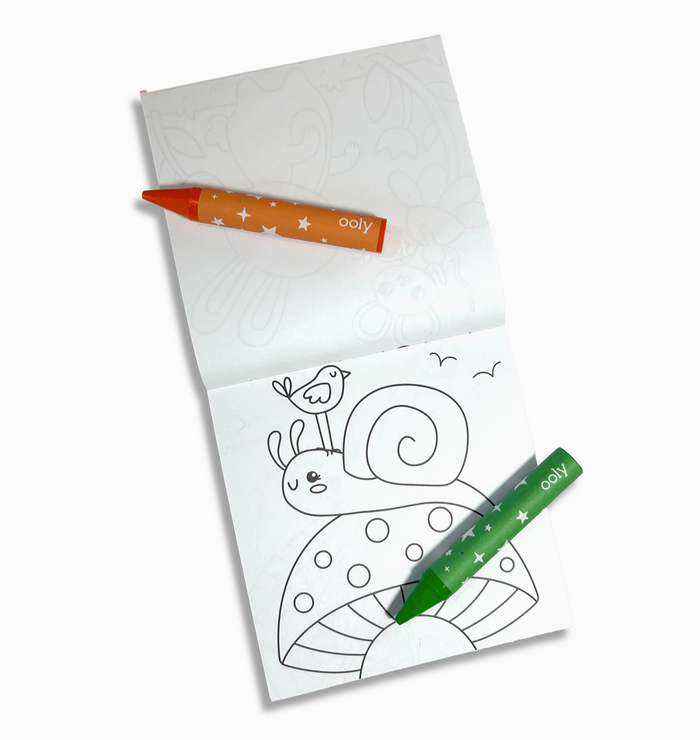 Coloring book with a snail illustration and two crayons on a white background