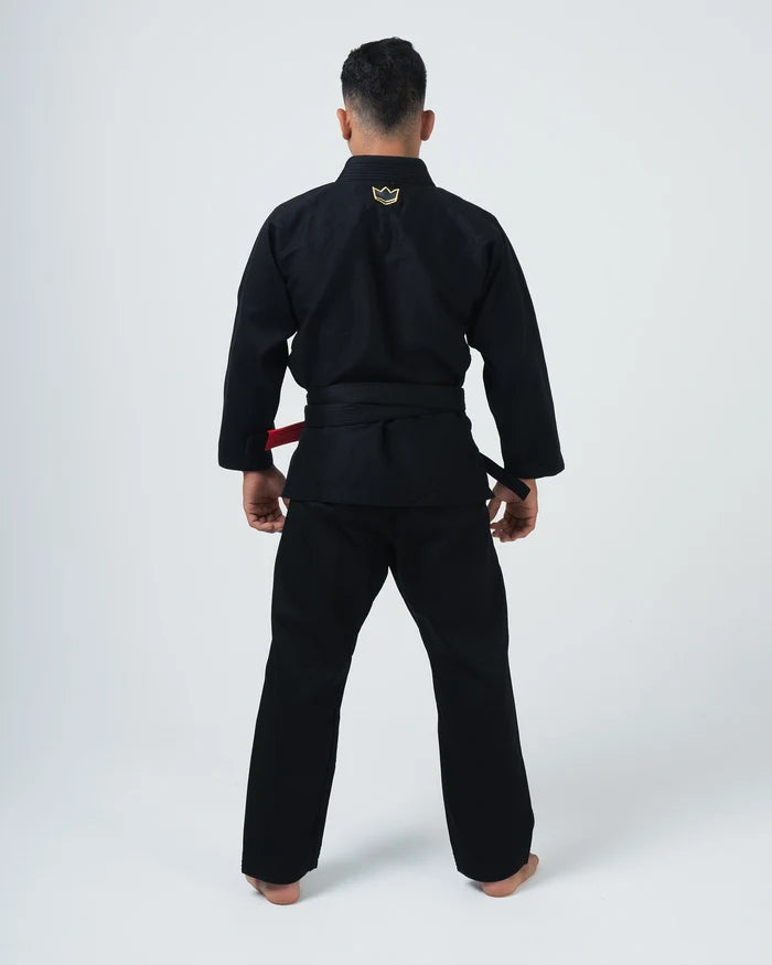 Kingz Comp 450 V6 BJJ Gi Black - Full Back View Second Male Athlete Gold Crown Logo Back Collar 450gsm High Tech Pearl Weave Kimono