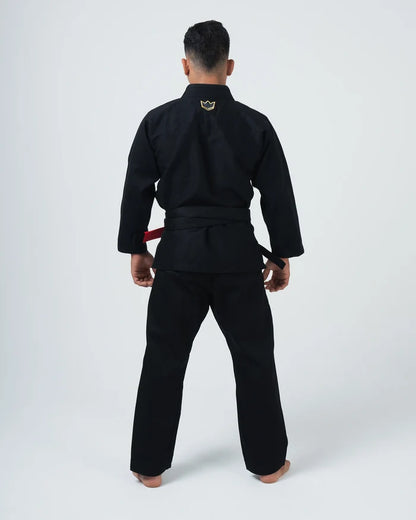 Kingz Comp 450 V6 BJJ Gi Black - Full Back View Second Male Athlete Gold Crown Logo Back Collar 450gsm High Tech Pearl Weave Kimono