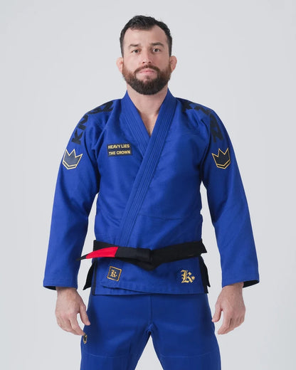 Kingz Comp 450 V6 Jiu Jitsu Gi - Blue - Front View Male Athlete Black Belt Yellow Crown Patch Shoulder Embroidery Heavy Lies The Crown Text Durable Weave BJJ Gi Training [color:Blue]