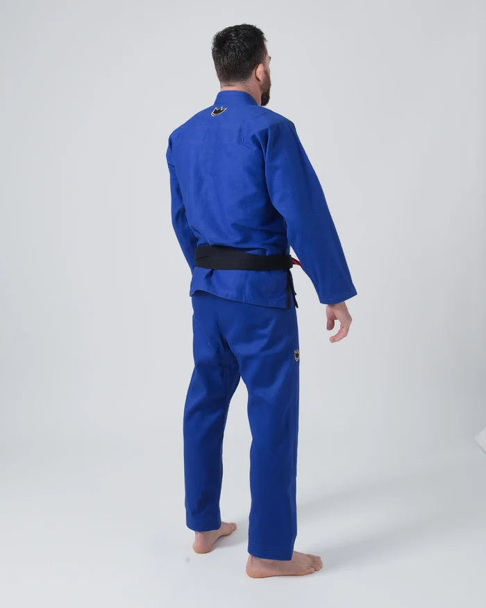 Kingz Comp 450 V6 Jiu Jitsu Gi - Blue - Back View Male Athlete Blue Gi Gold Crown Logo Upper Back Black Belt BJJ Training Kimono [color:Blue]