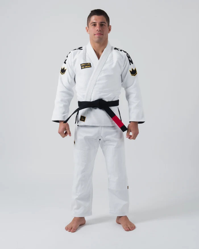 Kingz Comp 450 V6 Jiu Jitsu Gi - White - Full Body Front View Male Athlete Black Belt Gold Crown Patches Shoulder Text Heavy Lies The Crown Durable Cotton Fabric BJJ Gi Training Gear [color:White]