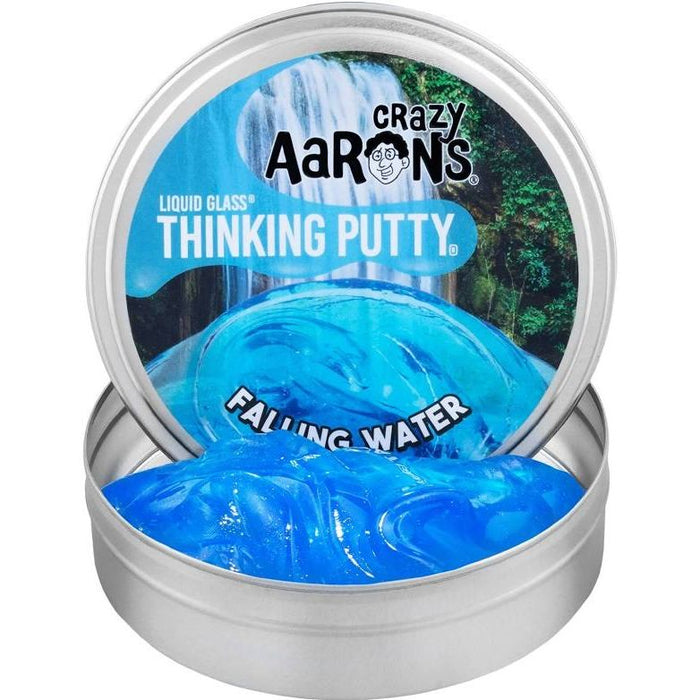 Open round metal tin of Crazy Aaron's Thinking Putty in the color 'Falling Water', showing bright blue translucent slime inside with the product label visible on the lid.
