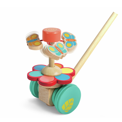 Colorful wooden toy with wheels and a stick on a white background