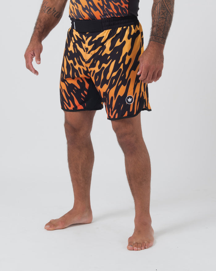 Kingz Flame Shorts Orange Black - Full Body Right Side Profile Male Athlete Bold Orange Black Tiger Flame Pattern Grappling Shorts Crown Logo White on Black Circle Right Outer Thigh Competition Cut Matching Flame Rashguard Bare Feet Men's No-Gi BJJ [color:Black/Flame]