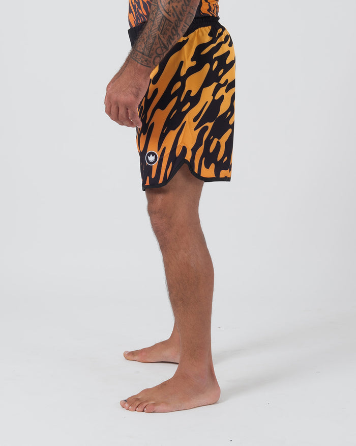Kingz Flame Shorts Orange Black - Full Body Left Side Profile Male Athlete Bold Orange Black Tiger Flame Pattern Grappling Shorts Crown Logo Right Outer Thigh Matching Flame Pattern Rashguard Bare Feet Men's No-Gi BJJ [color:Black/Flame]