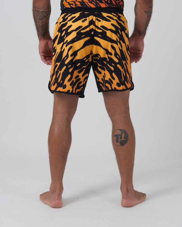 Kingz Flame Shorts Orange Black - Full Body Back View Male Athlete Bold Orange Black Tiger Flame Pattern Grappling Shorts Back Panel Black Waistband Side Vents Matching Flame Rashguard Bare Feet Men's No-Gi BJJ [color:Black/Flame]