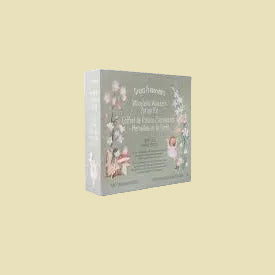 Product packaging with floral design and text on a white background
