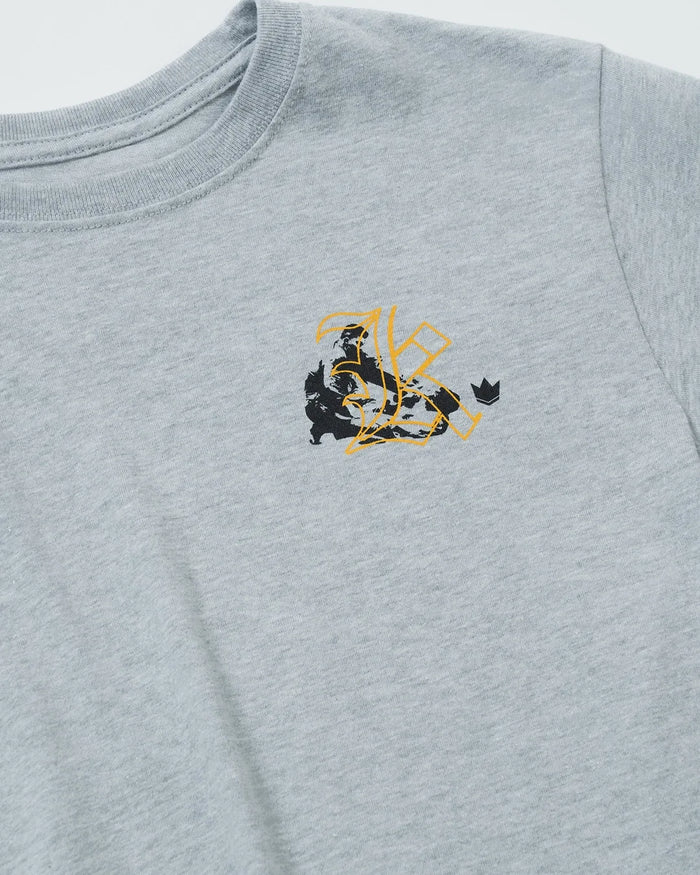 Kingz Jiu Jitsu Culture Youth Tee - Detail Shot - Gold Grappler Chest Graphic Close-up - Light Gray Youth BJJ Tee [color:Light Gray]