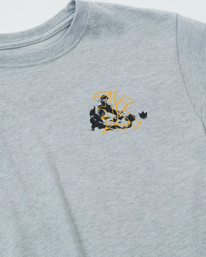 Kingz Jiu Jitsu Culture Youth Tee - Detail Shot - Gold Grappler Chest Graphic Close-up - Light Gray Youth BJJ Tee [color:Light Gray]