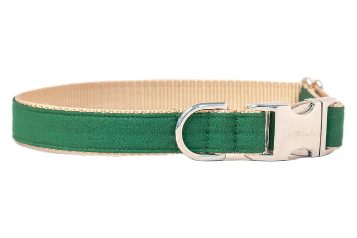 Elegant and durable dog collar by Crew LaLa, crafted with a kelly green fabric exterior, webbed backing for comfort, and luxe metal accents—including a secure clasp engraved with the brand name—for dogs who love to stand out on their daily strolls.