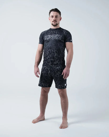 Kingz Acid Wash Rashguard Black - Full Body Straight Front View Barefoot Male Athlete Short Sleeve KINGZ White Outline Bold Text Acid Wash Black Dot Pattern Shorts BJJ Training [color:Black/Acid]