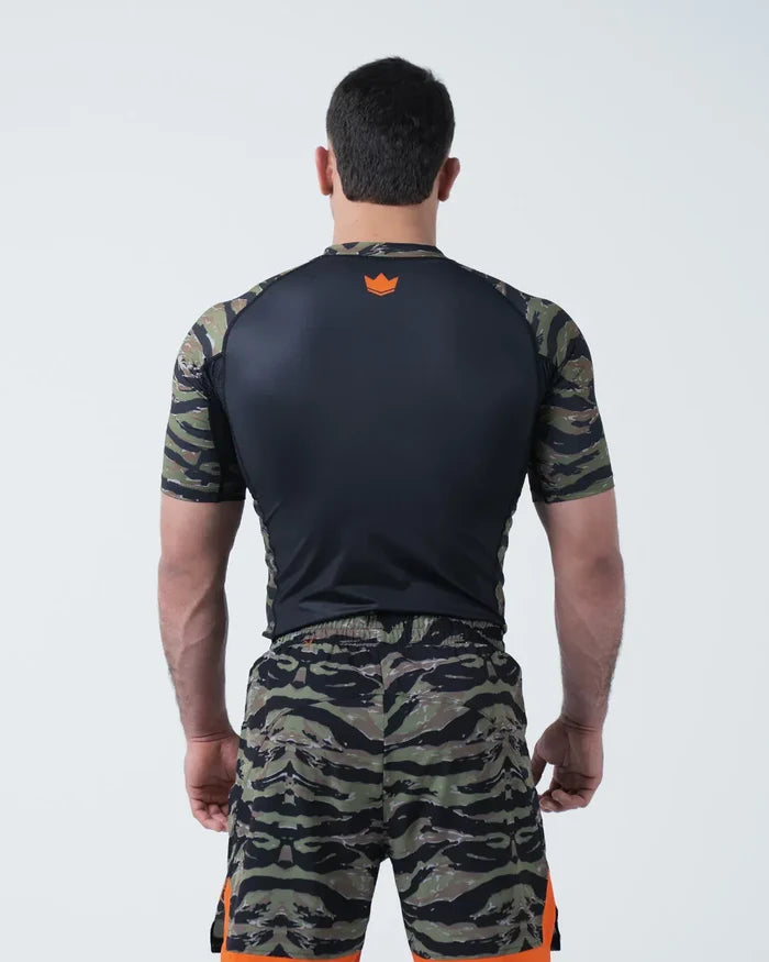 Kingz Always Hunting Rashguard Green Camo - Upper Body Straight Back View Male Athlete Short Sleeve Orange Crown Logo Upper Back Tiger Camo Sleeves Black Back Panel [color:Green Camo]