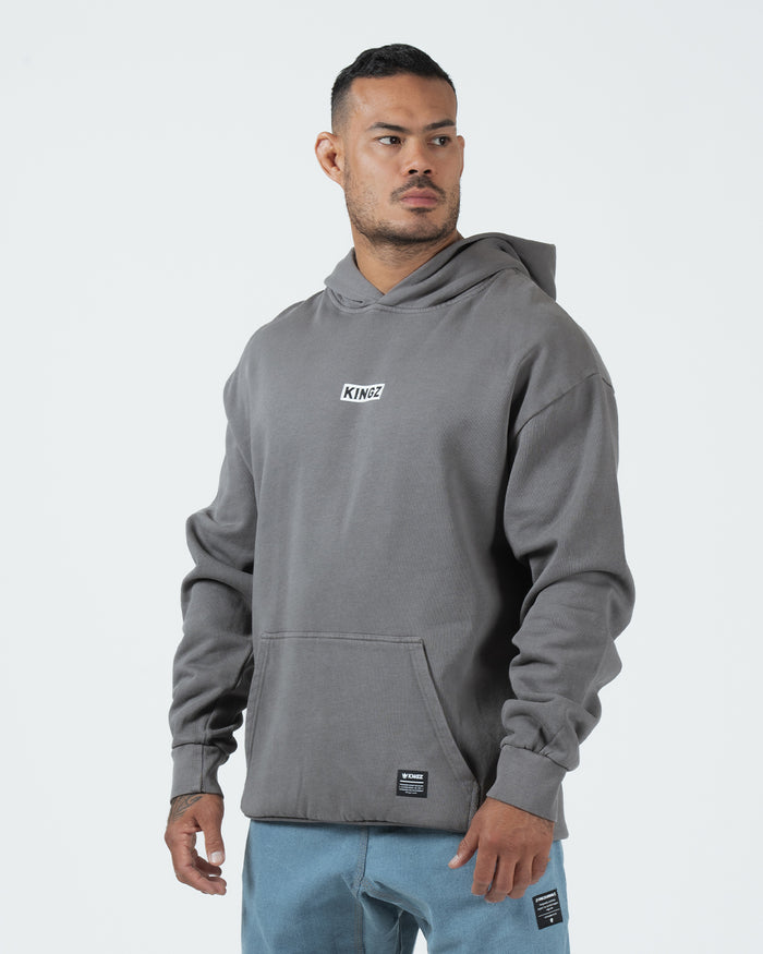 Kingz Box Hoodie - Side View - Model Angled Fit with Chest Logo - Grey - Men's BJJ Training Hoodie [color:Grey]