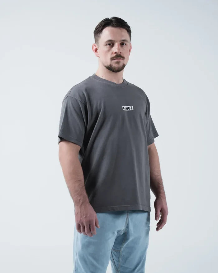 Kingz Box Tee - Front Lifestyle View - KINGZ Box Label Pigment Dyed Heavyweight Worn With Jeans - Grey BJJ [color:Grey]