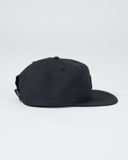 Kingz Crown Patch 5-Panel Strapback Hat Black - Side View Black Hat Subtle Crown Patch Adjustable Strap Minimalist Design Casual BJJ Training Apparel [color:Black]