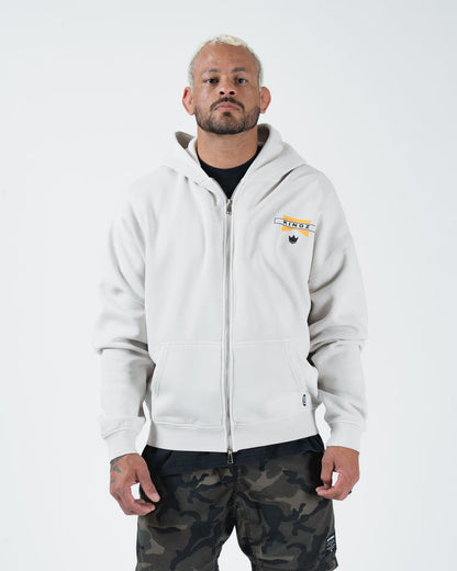 Grey BJJ zip up hoodie front view on adult male model showing Kingz flag chest logo and full zipper