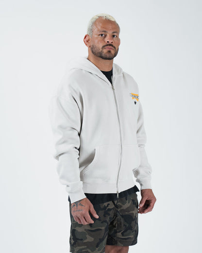 Grey BJJ zip up hoodie side profile view on adult male model showing full zipper and relaxed fit drape