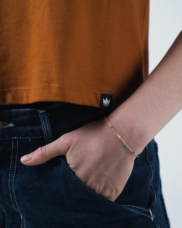 Kingz Women's Heavyweight Tee - Detail Shot - Crown Hem Tab Boxy Fit - Vintage Orange Women's BJJ Tee [color:Vintage Orange]