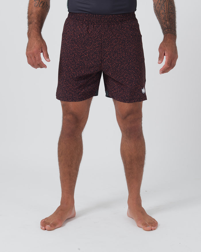Kingz Hybrid Shorts Noise Red - Full Body Front View Male Athlete Dark Burgundy Maroon Red Noise Speckle Texture Pattern White Crown Logo Right Thigh Black Elastic Waistband Inner Compression Shorts Competition Cut Men's Grappling Shorts No-Gi BJJ [color:Noise Red]