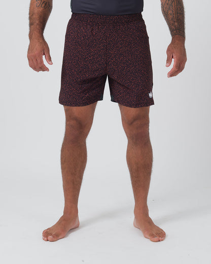Kingz Hybrid Shorts Noise Red - Full Body Front View Male Athlete Dark Burgundy Maroon Red Noise Speckle Texture Pattern White Crown Logo Right Thigh Black Elastic Waistband Inner Compression Shorts Competition Cut Men's Grappling Shorts No-Gi BJJ [color:Noise Red]