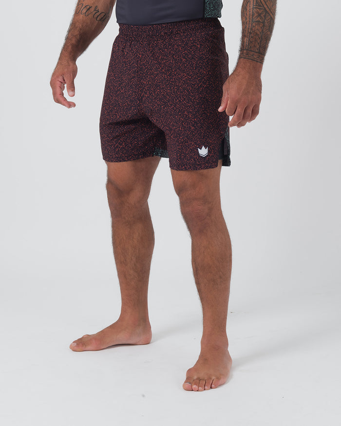 Kingz Hybrid Shorts Noise Red - Full Body Right Side Profile Male Athlete Dark Burgundy Red Noise Speckle Pattern Crown Logo Right Thigh Inner Compression Shorts Visible Side Split Men's Grappling Shorts No-Gi BJJ [color:Noise Red]