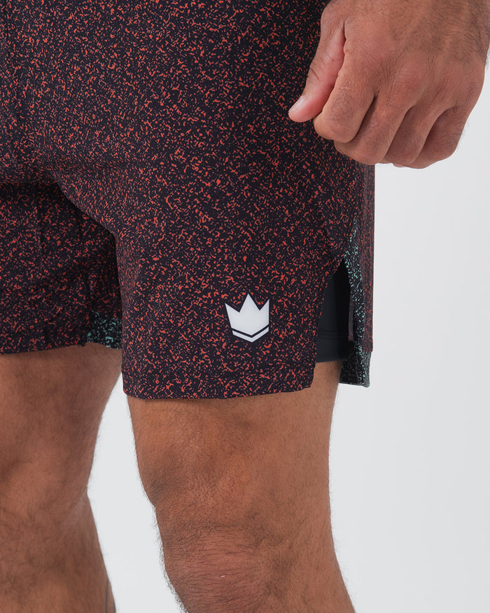 Kingz Hybrid Shorts Noise Red - Full Body Right-Back Side Profile Alternate Stance Male Athlete Dark Burgundy Red Noise Pattern KINGZ Badge Right Side Teal Inner Compression Shorts Black Side Panels Men's Grappling Shorts No-Gi BJJ [color:Noise Red]