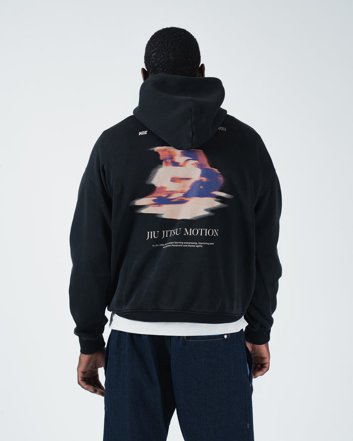 Black BJJ hoodie front studio shot on adult male model showing pigment washed fabric and mid-weight fleece [color:Black]