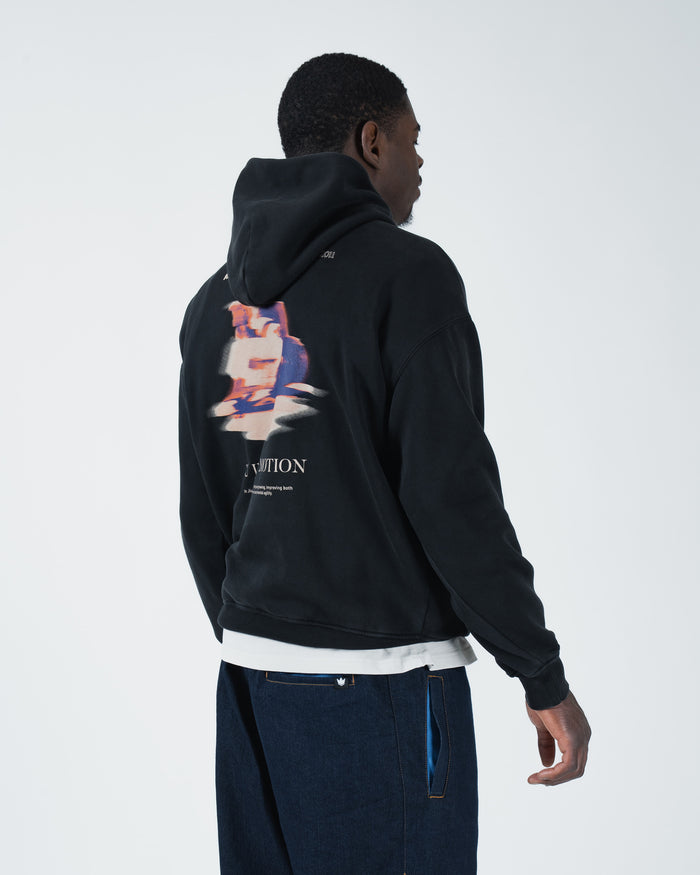 Black BJJ hoodie front view on adult male model showing ribbed cuffs snap collar and kangaroo pocket [color:Black]