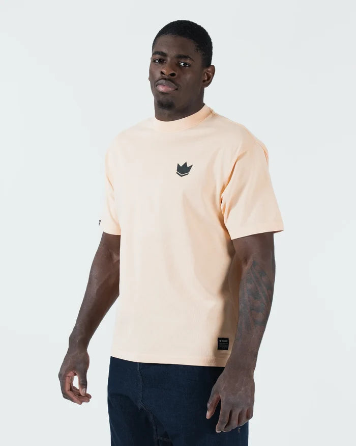 Kingz Jiu Jitsu Motion Tee - Three-Quarter Front View - Crown Logo Chest - Peach BJJ Pigment Dye Tee [color:Peach]