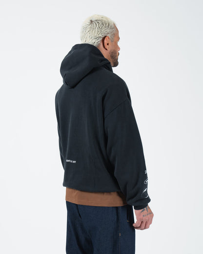 Black BJJ hoodie rear side profile on adult male model showing sleeve graphics and back detail closeup [color:Black]