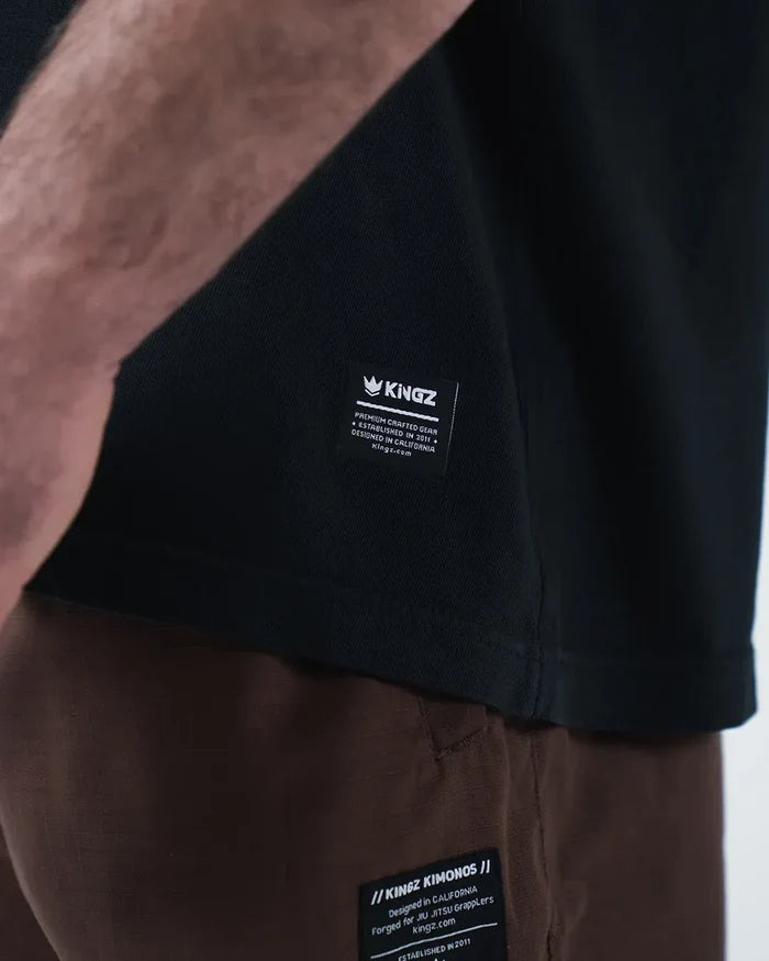 Kingz JJ Dept Tee - Side Label Detail Shot - Kingz Premium Crafted Gear Label Kingz Kimonos BJJ Tag [color:Black]
