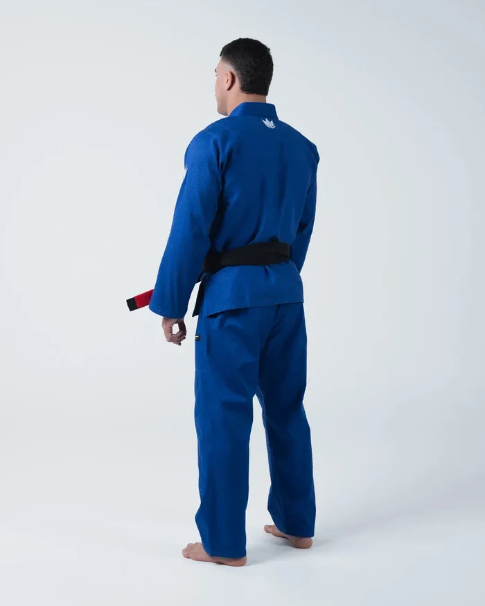 Kingz Kore V2 Jiu Jitsu Gi Blue - Back View Male Athlete Blue Gi White Crown Logo Upper Back Black Belt BJJ Gi Training [color:Blue]