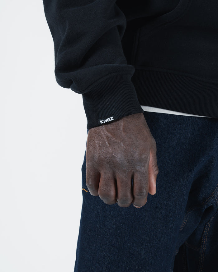 Kingz Kore V2 Zip Up Hoodie - Cuff Detail Close Up - Ribbed Cuff with Kingz Print - Black - BJJ Streetwear Hoodie [color:Black]
