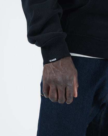 Kingz Kore V2 Zip Up Hoodie - Cuff Detail Close Up - Ribbed Cuff with Kingz Print - Black - BJJ Streetwear Hoodie [color:Black]