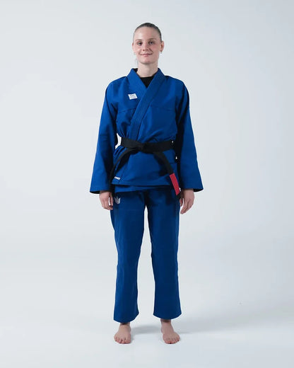 Kingz Kore V2 Women's BJJ Gi Blue - Full Body Front View Female Athlete Black Belt Red Bar Women's Slim Cut Fit