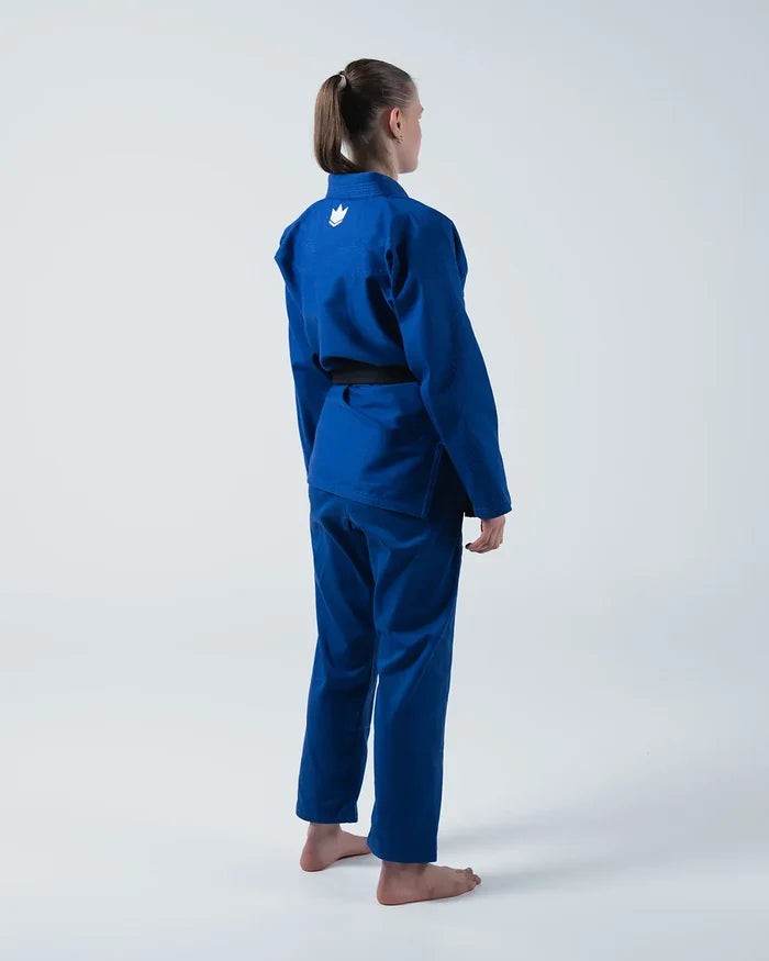 Kingz Kore V2 Women's BJJ Gi Blue - Full Body 3/4 Side Back View Female Athlete Black Belt Crown Logo Chest Women's Gi