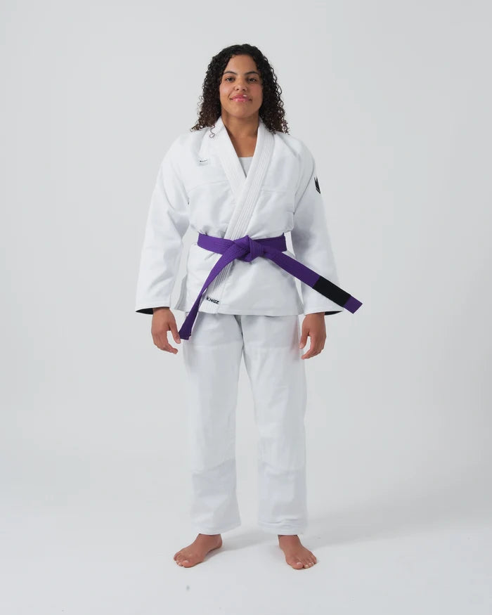 Kingz Kore V2 Women's BJJ Gi White - Full Body Front View Female Athlete Purple Belt Complete Gi Jacket Pants
