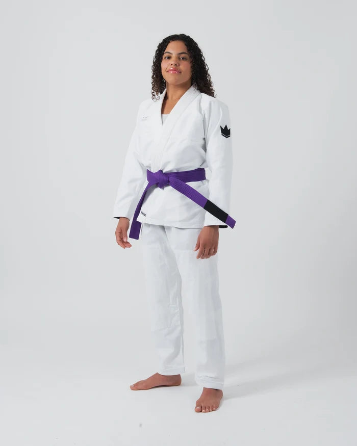Kingz Kore V2 Women's BJJ Gi White - 3/4 Angled Front View Female Athlete Purple Belt Crown Logo Women's Slim Cut
