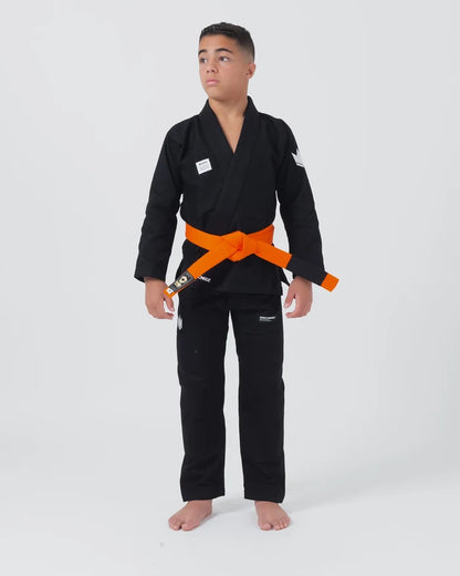 Kingz Kore V2 Youth BJJ Gi Black - Full Body Front View Teen Athlete Orange Belt KINGZ Logo Complete Youth Gi