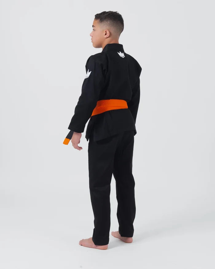 Kingz Kore V2 Youth BJJ Gi Black - Full Body 3/4 Back View Teen Athlete Orange Belt Dual Crown Logo Youth Kids