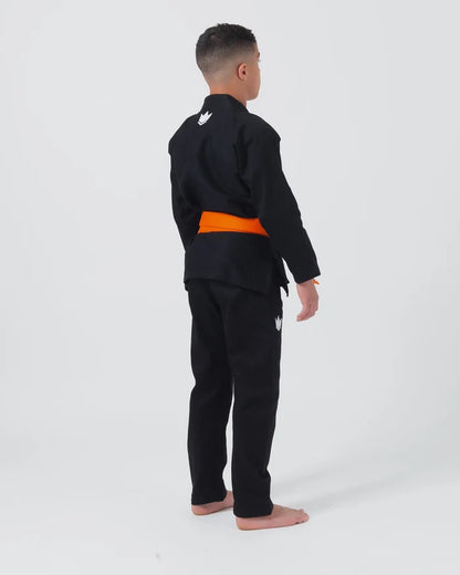 Kingz Kore V2 Youth BJJ Gi Black - Full Body Side Back View Youth Athlete Orange Belt Crown Logo Youth Kids Gi