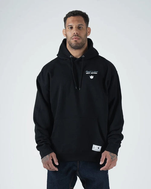 Kingz Leandro Lo Respect Hoodie - Front View - Chest Logo Worn by Male Model - Black - BJJ Lifestyle Hoodie [color:Black]