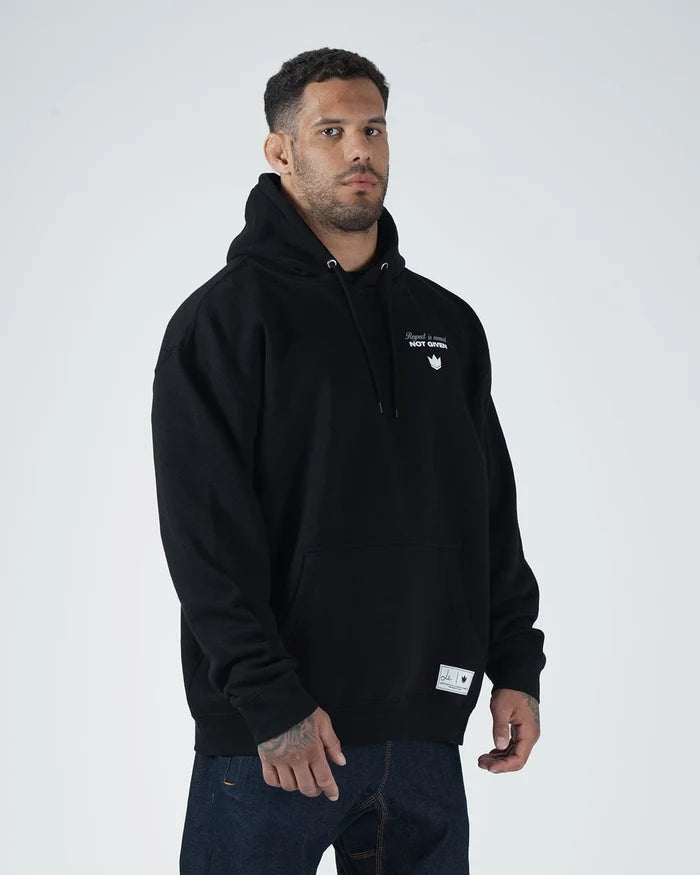 Kingz Leandro Lo Respect Hoodie - Worn Lifestyle Shot - Front Chest Graphic - Black - BJJ Streetwear Hoodie [color:Black]