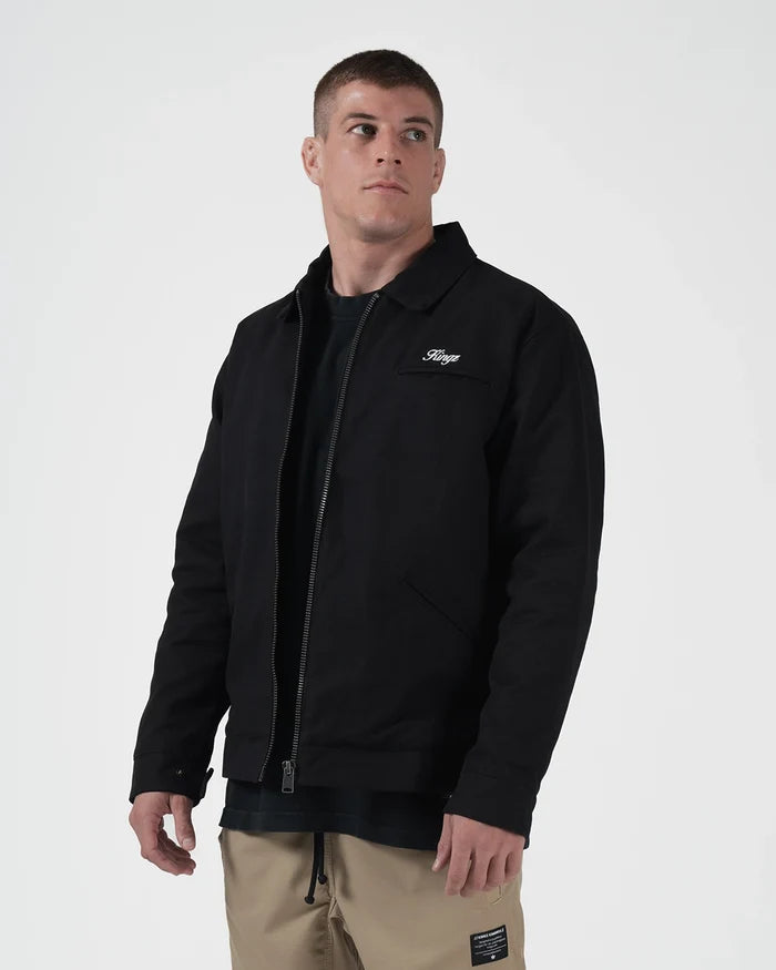 Kingz Mechanic Jacket Black - Front View Male Athlete Black Zip-Up Jacket Embroidered Kingz Logo Left Chest Classic Collar Casual Fit Outerwear BJJ Training [color:Black]